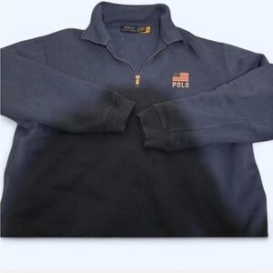 Classic Polo Ralph Lauren quarter-zip sweatshirt in a deep navy blue.